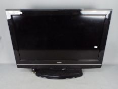 A 32" HD Ready LCD television.