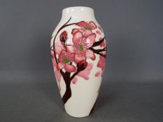 Moorcroft - a Moorcroft Confetti vase signed E Bossons, approx height,