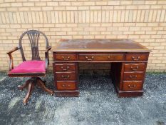 A pedestal desk, measuring approximately 78 cm x 137 cm x 76 cm and a chair.