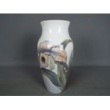 A large Royal Copenhagen vase with floral decoration,