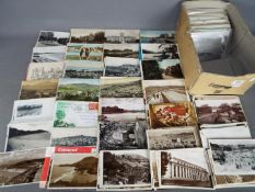 In excess of 400 early-mid period postcards of Wales with a few modern ones to include real photos,