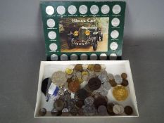 A mixed lot of coins, medals and tokens to include a National Rose Society bronze medallion,