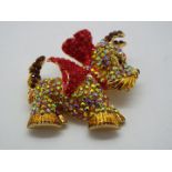 Butler & Wilson - a Butler & Wilson stone set brooch in the form of a West Highland Terrier,