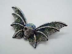 Butler & Wilson - a Butler & Wilson stone set brooch in the form of a butterfly with centre