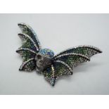 Butler & Wilson - a Butler & Wilson stone set brooch in the form of a butterfly with centre