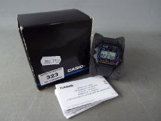 A gentleman's Casio digital display sports wristwatch in original box.