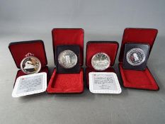 Four silver 1 dollar Canada coins comprising 2 x 1977, 1984 and 1986, all cased.