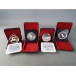 Four silver 1 dollar Canada coins comprising 2 x 1977, 1984 and 1986, all cased.