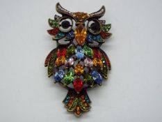 Butler & Wilson - a Butler & Wilson multicoloured stone set brooch in the form of an owl,