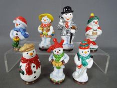 Halcyon Days - Seven Halcyon Days enamel bonbonnieres each in the form of a snowman.