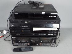 Lot to include a Sony CD Player model CDP-313, a Sony twin tape deck model TC-W230,