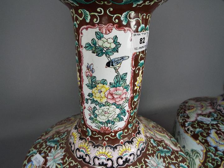 A large pair of Chinese enamel vases decorated to the body with panels of landscape scenes, - Image 3 of 5