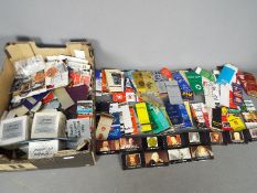 A large collection of match book covers and match books.