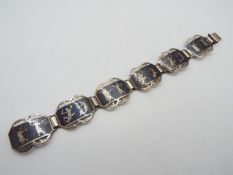 A Thai silver ornate bracelet,