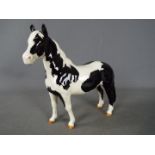 Beswick - a Beswick black and white Piebald Pinto pony, 16 cm.