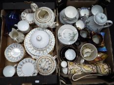 A mixed lot of ceramics to include Wade, Royal Doulton, Japanese and similar, two boxes.