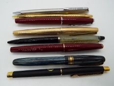 A collection of pens to include a Parker 61, a Parker 17, a Waterman's W5 with 14ct nib and similar.