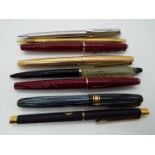 A collection of pens to include a Parker 61, a Parker 17, a Waterman's W5 with 14ct nib and similar.