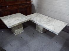 Two marble tables, largest approximately 45 cm x 140 cm x 70 cm.