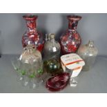 A mixed lot of glassware to include an art glass bowl, cranberry cut to clear bowl,