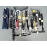 A collection of modern wristwatches and similar, lady's and gentleman's.