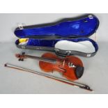 Violin - An early 20th century violin, two piece back,