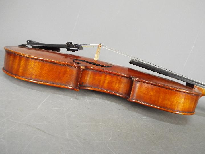Violin - A late 19th / early 20th century violin, two piece back, - Image 7 of 8