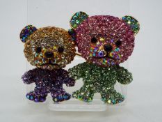 Butler & Wilson - a Butler & Wilson multicoloured stone set brooch in the form of two teddy bears,