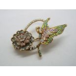 Butler & Wilson - a Butler & Wilson stone set brooch in the form of a butterfly with flower,