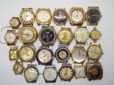 A collection of vintage wristwatch heads, lady's and gentleman's.