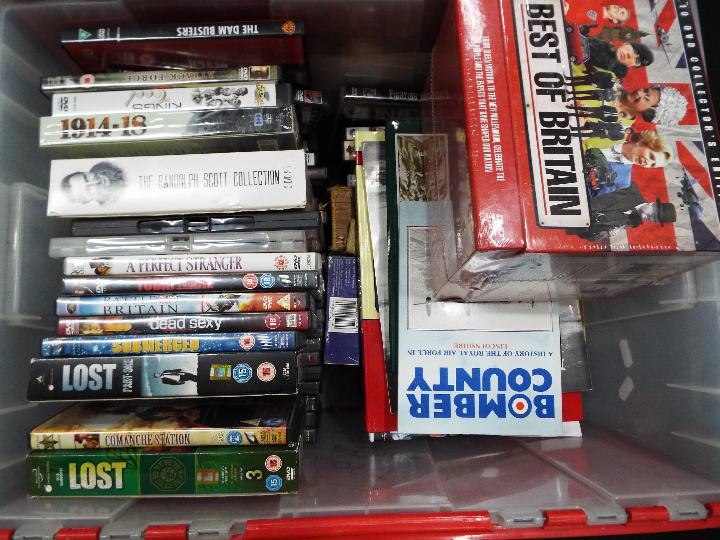 A collection of books, DVD's and CD's, many military related, two boxes. - Image 2 of 3
