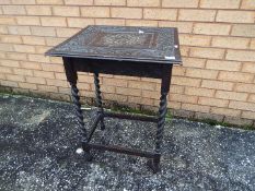 A side table with barley twist supports and carved top 'Gwynfa And Bont 1914 - 1917',