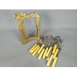 A art nouveau style picture frame and a