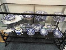 A collection blue and white dinner wares