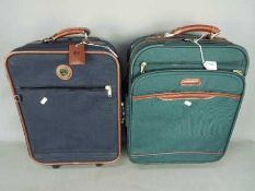 Two pieces of travel luggage including o