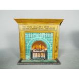 A vintage tinplate charity collection box for the Young Leaguers Union of the National Childrens