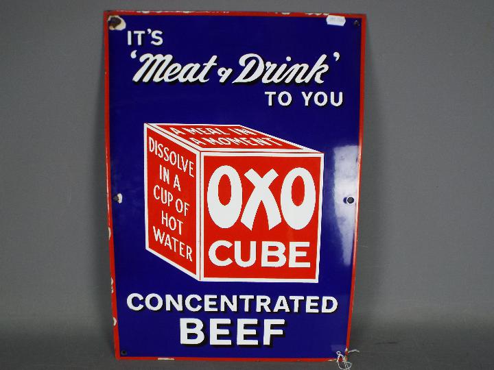 A vintage enamel sign for Oxo Beef Cubes, approximately 51 cm x 36 cm.