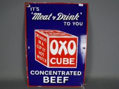 A vintage enamel sign for Oxo Beef Cubes, approximately 51 cm x 36 cm.