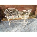 Garden furniture - a white painted metal love seat / kissing seat,