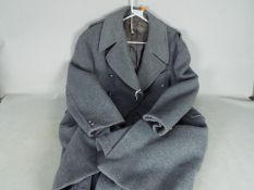 A gentleman's RAF greatcoat by Gieves of 27 Old Bond Street, London,