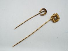 14 kt gold - a 14 kt gold tie pin set with pearl,