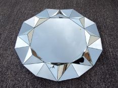 A good quality modern wall mirror,