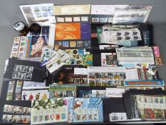 Philately - A large quantity of predominantly mint stamps, presentation packs and similar,