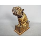 A late 19th century cast iron, mechanical money bank by J & E Stevens Co.