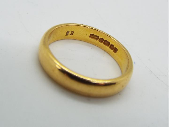 22 ct gold - a hallmarked 22 ct gold wedding band, - Image 2 of 4