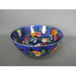 A Wiltshaw & Robinson Carlton Ware bowl decorated in the Orchard pattern with berries,