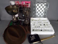 A mixed lot to include Scrabble game, plated trophies, glass chess set,