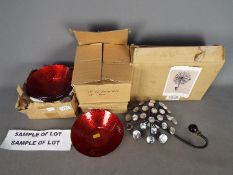 Unused Retail Stock - Sixteen red modern decorative glass bowls and a metal wall art item with