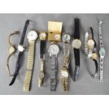 A collection of wristwatches and a travel clock to include Arctos, Sekonda, Accurist,