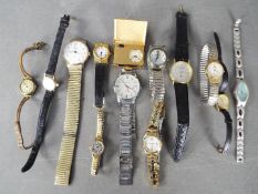 A collection of wristwatches and a travel clock to include Arctos, Sekonda, Accurist,